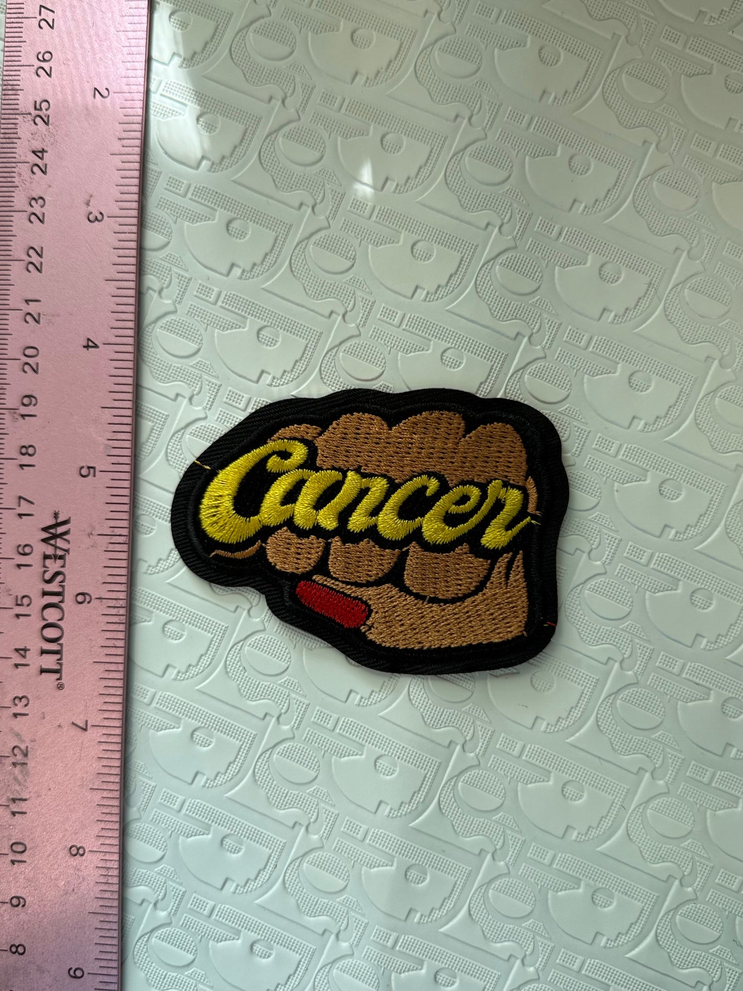 Fist sign iron on patch