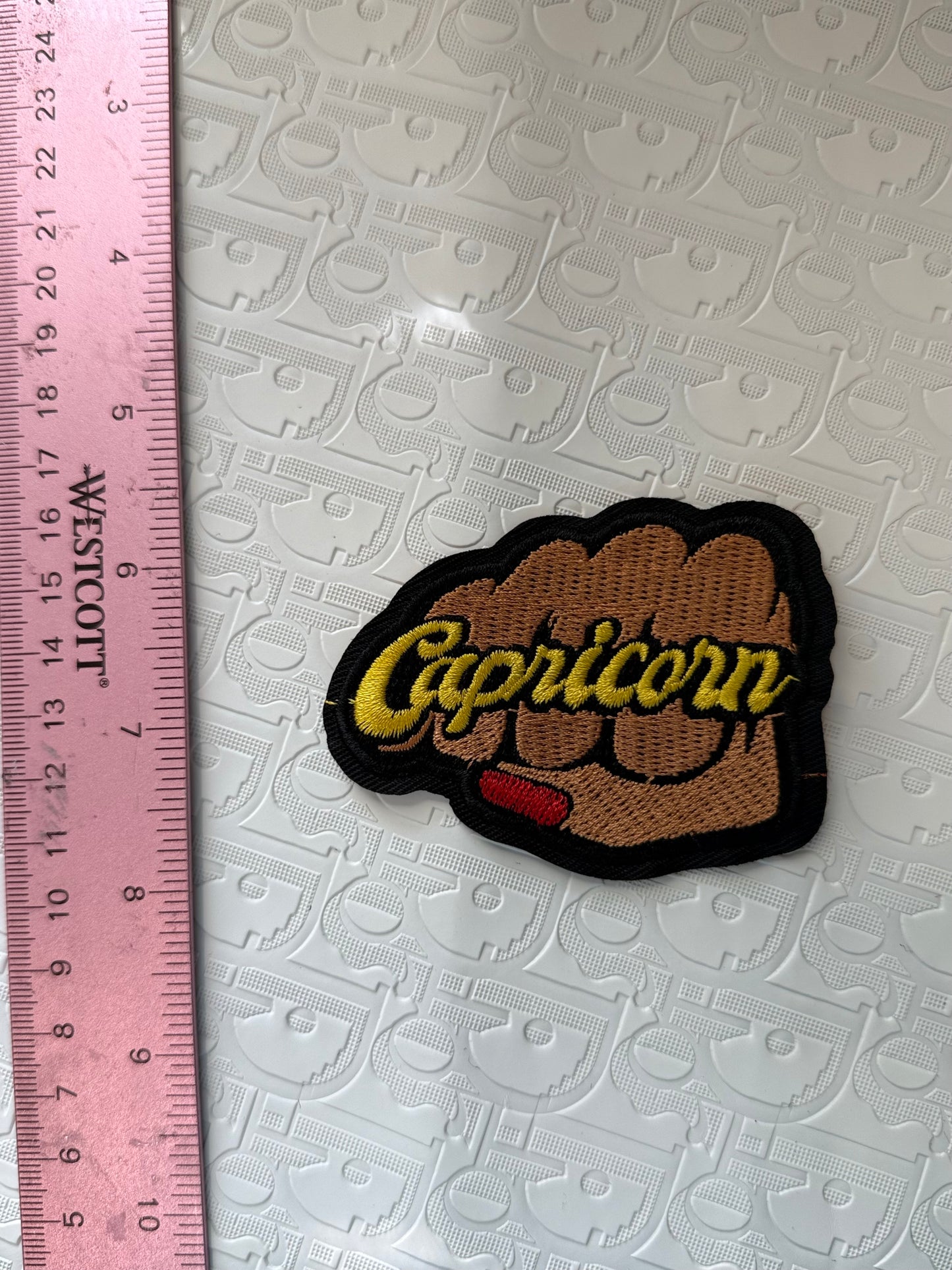 Fist sign iron on patch