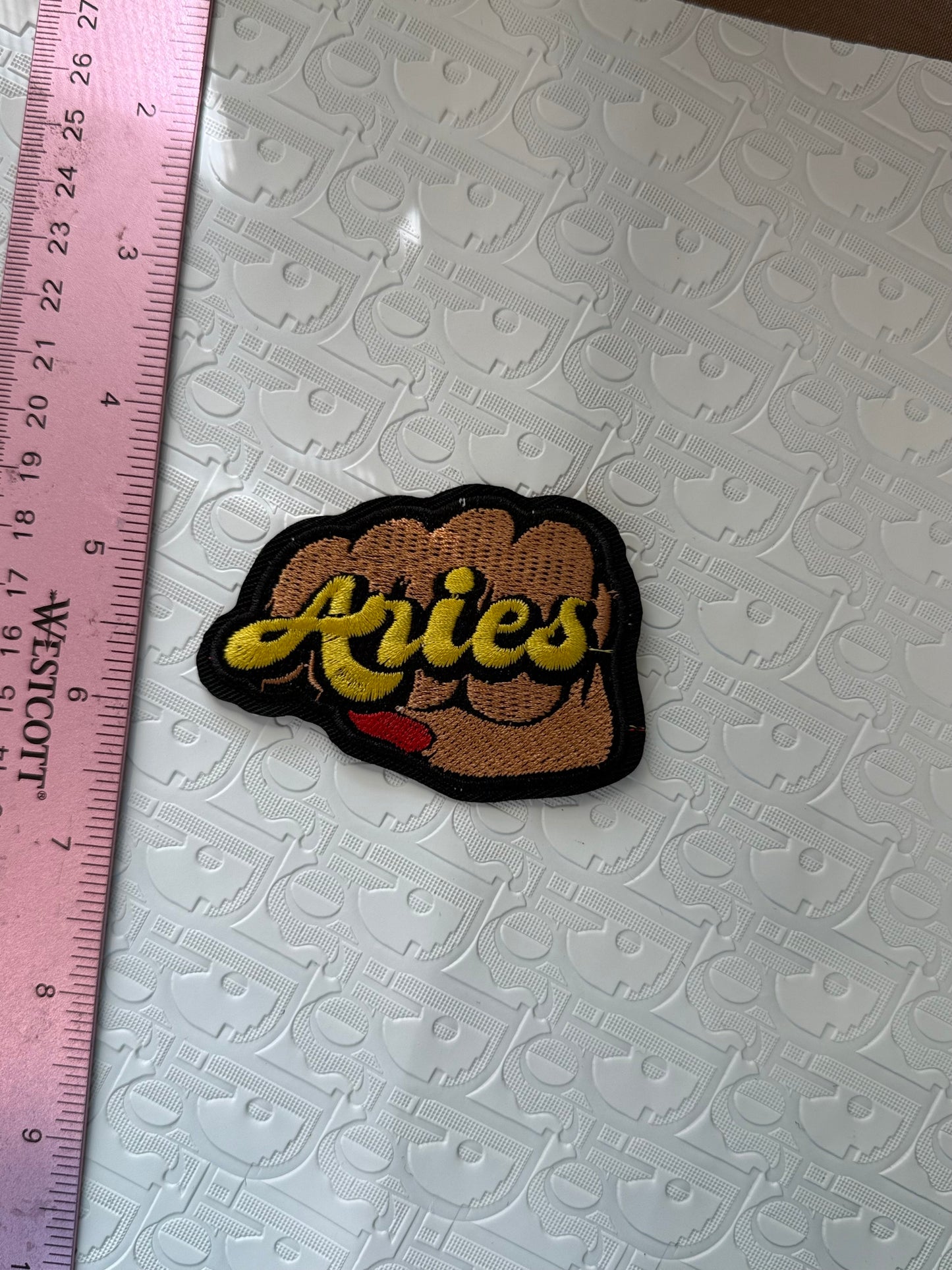 Fist sign iron on patch