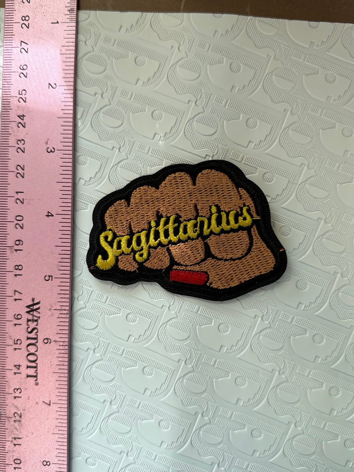 Fist sign iron on patch