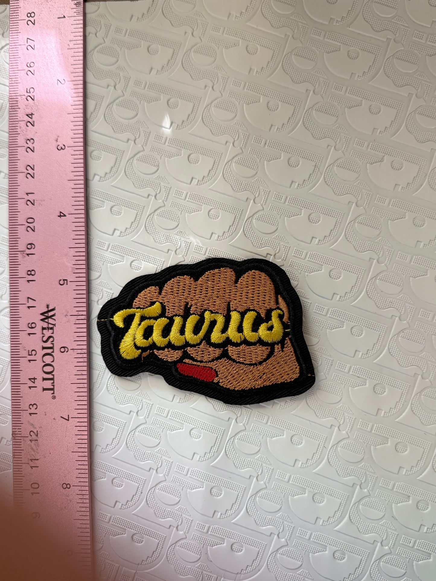 Fist sign iron on patch