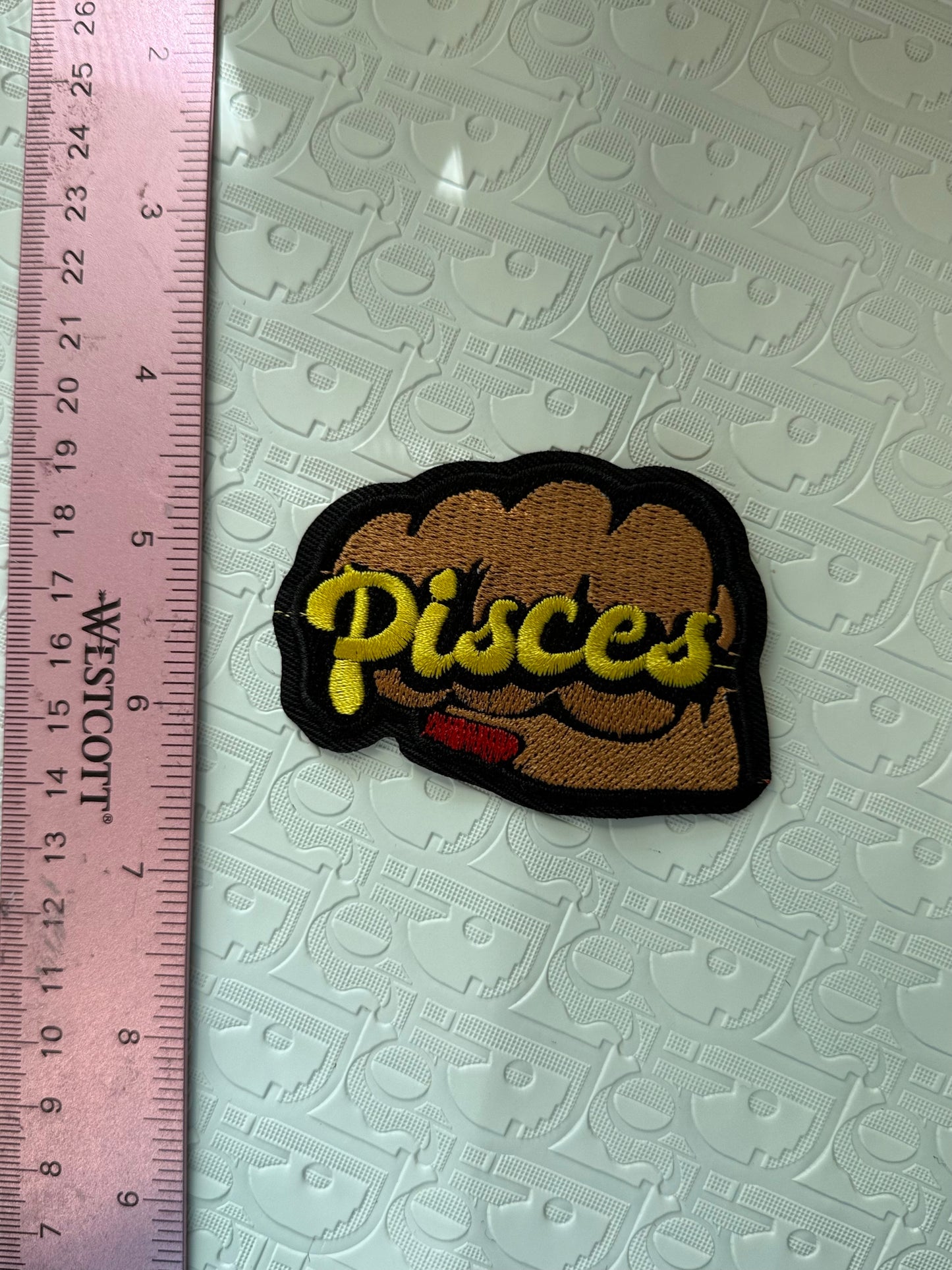 Fist sign iron on patch