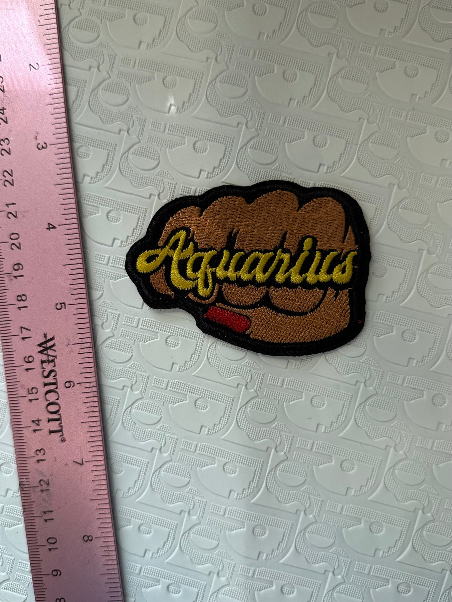 Fist sign iron on patch
