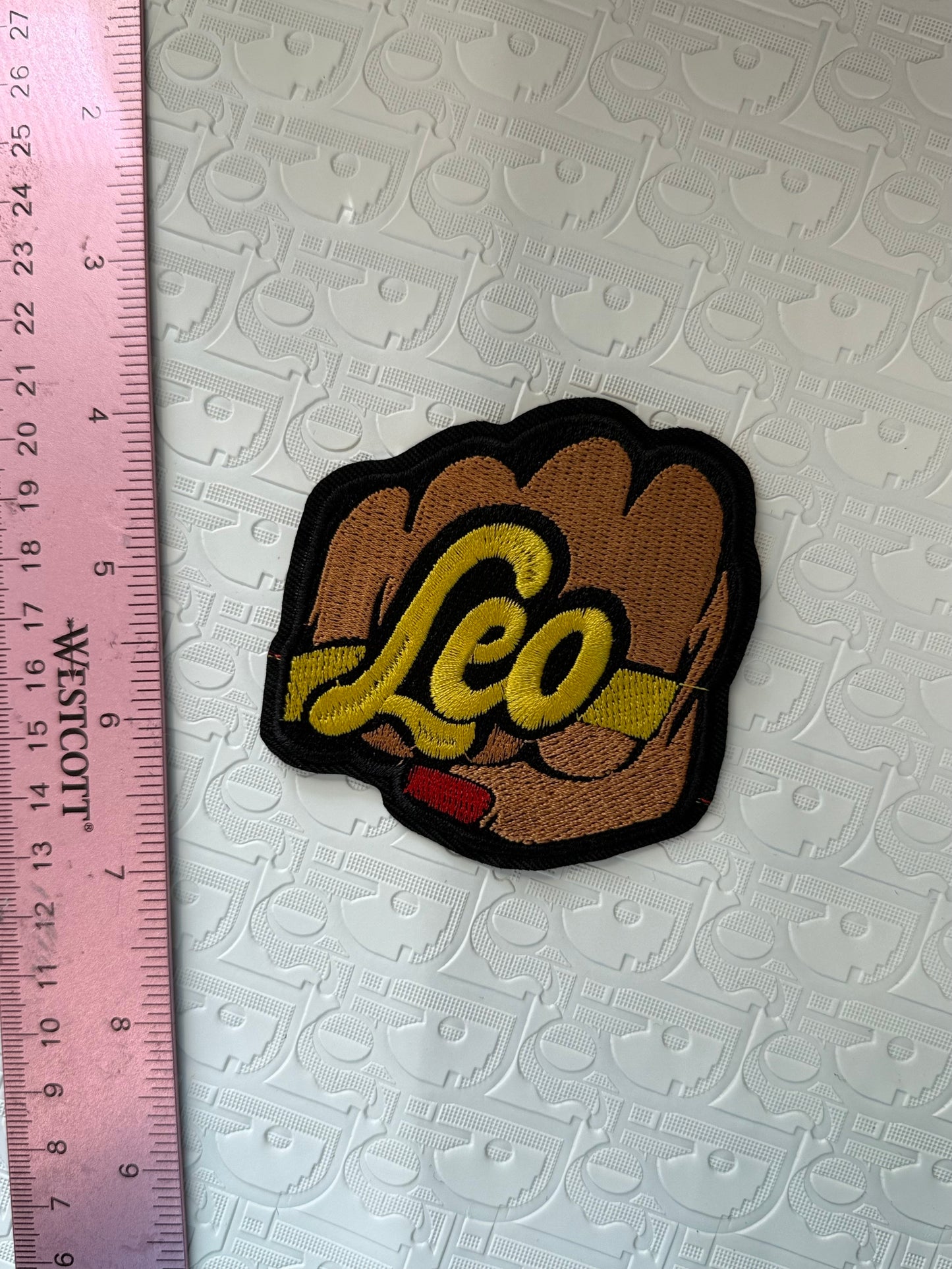 Fist sign iron on patch