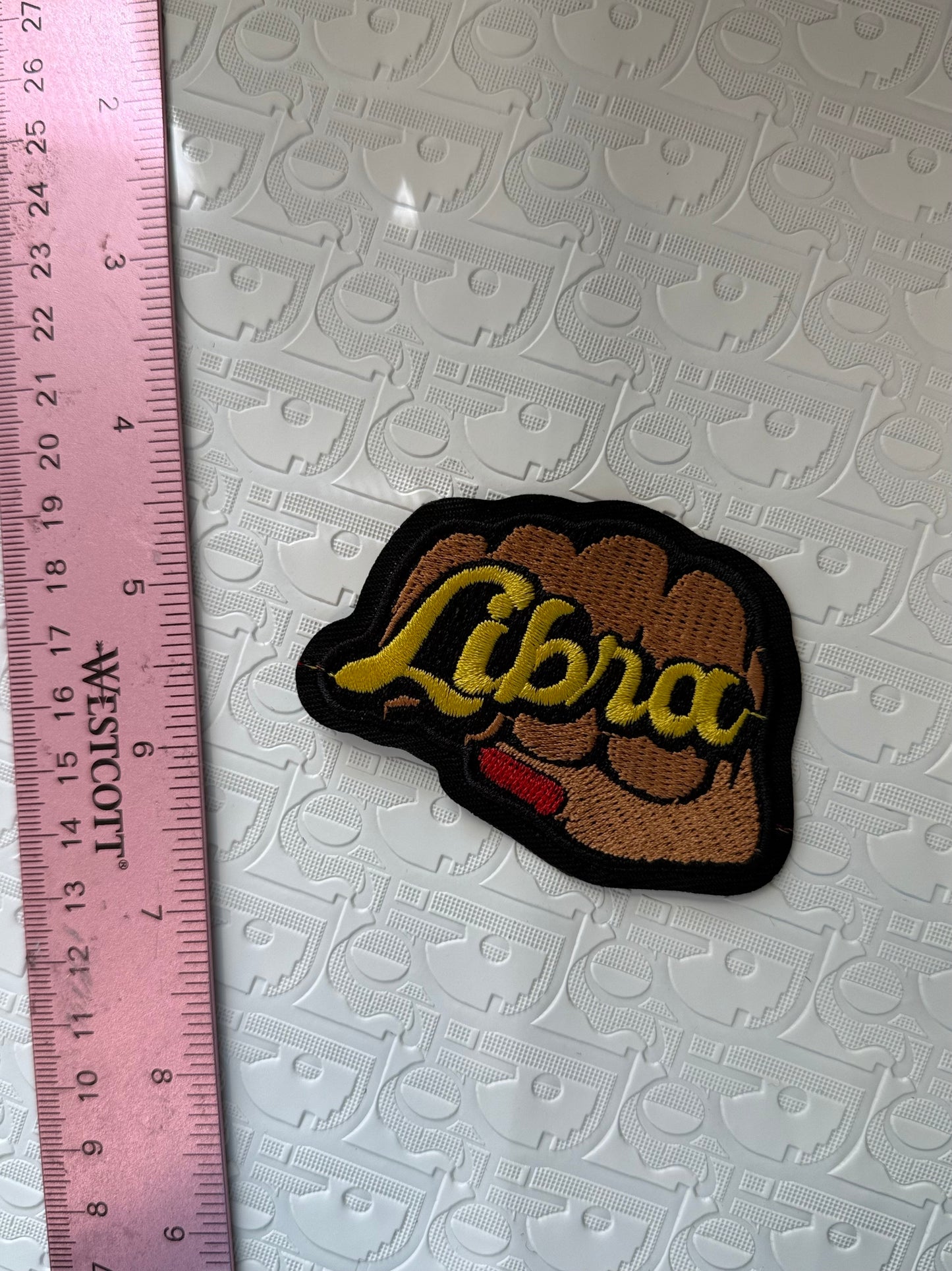 Fist sign iron on patch
