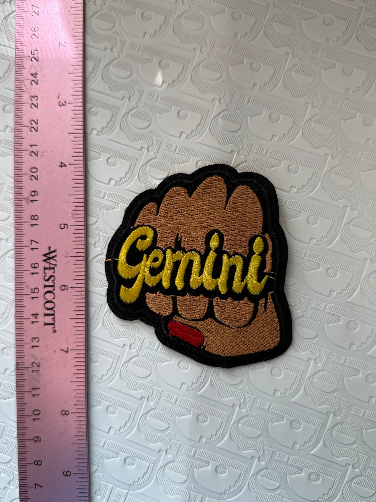 Fist sign iron on patch