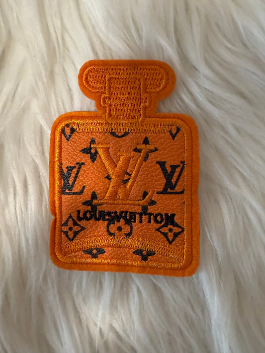 Orange LV cologne bottle faux leather iron on patch
